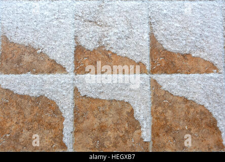 snowdrift pattern on stone tile Stock Photo
