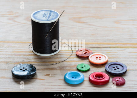 Cotton reels and buttons. Stock Photo