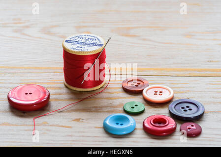 Cotton reels and buttons. Stock Photo