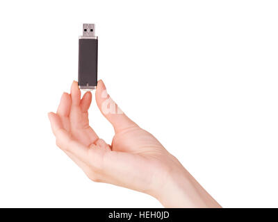 Woman hand holding flash pc card. Isolated on white, clipping path included Stock Photo