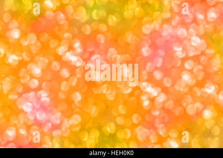 Bright abstract multicolor background with defocused light. In golden and pink colors Stock Photo