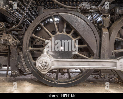 Sixty-three-inch driving wheel and connecting rod of 1926 steam locomotive. Stock Photo