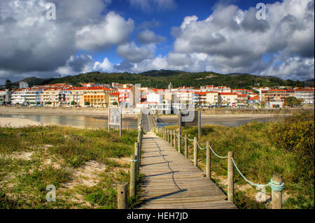 Boardwalk through the sand dunes on beach in Portugal Stock Photo