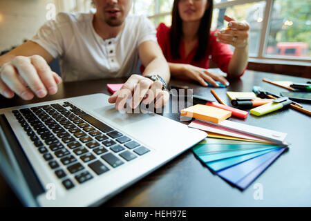 Modern designers searching for information online Stock Photo