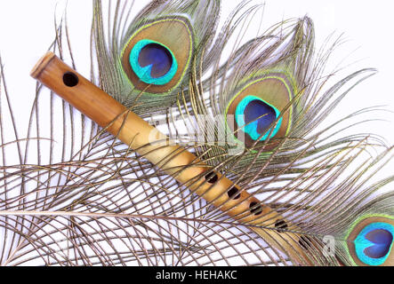 Indian Flute With Peacock Feather Stock Photo