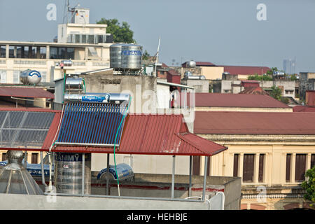 Solar hot water heater installed on rooftop. Stock Photo