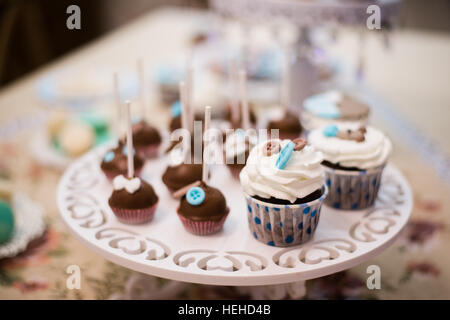 Different delicious desserts and cakes on the buffet table Stock Photo
