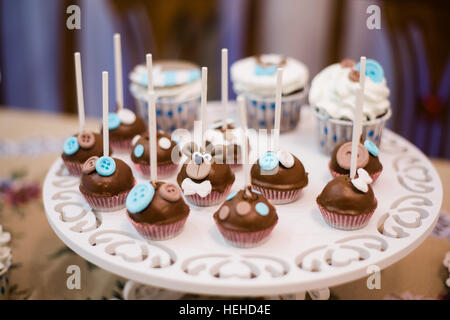 Baby cupcakes on the table. Stock Photo
