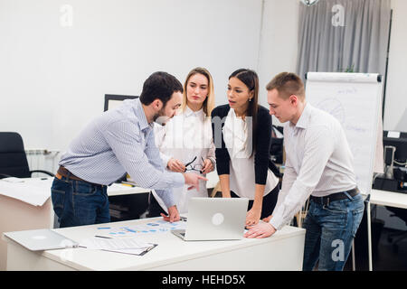 Group Young Coworkers Making Great Business Decisions.Creative Team Discussion Corporate Work Concept Modern Office.Startup Marketing Idea Presentation. Stock Photo