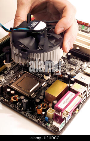 CPU processor fan, cooling chip on a motherboard, mainboard Stock Photo