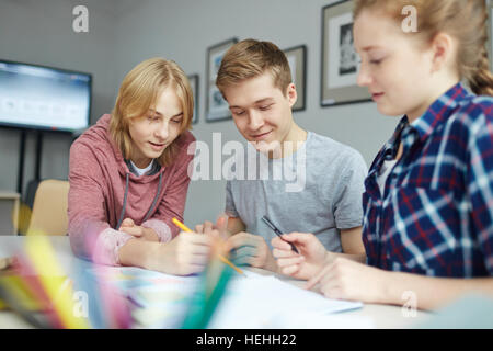 Clever students discussing their creative ideas Stock Photo
