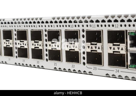 Fiber optic gigabit ethernet switch with SFP module slot and UTP category 5 connectors RJ-45 isolated on white background Stock Photo