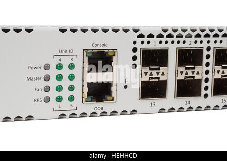 Fiber optic gigabit ethernet switch with SFP module slot and UTP category 5 connectors RJ-45 isolated on white background Stock Photo