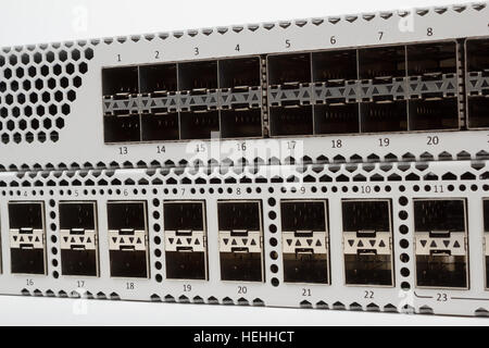 detail of fiber optic gigabit ethernet switch with SFP module slot and UTP category 5 connectors RJ-45 Stock Photo