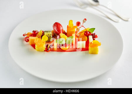 amazing fruit salad creative beautiful prepared pineapple pear kiwi orange strawberry berry Stock Photo