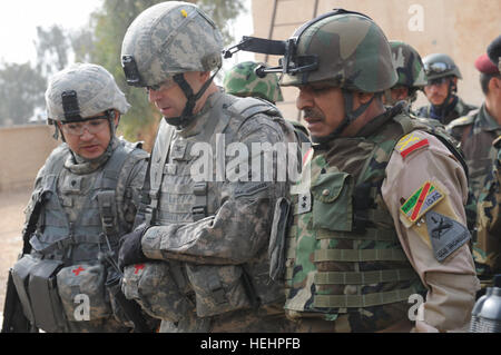 Commanders from the 9th Iraqi Army Division and 2nd Brigade Combat Team ...