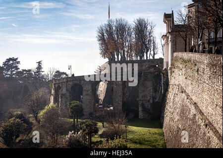 Ruins of old bridge at old town Cita Alta of Bergamo town in Italy Stock Photo