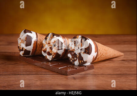 chocolate ice cream and cream on the chocolate bar Stock Photo