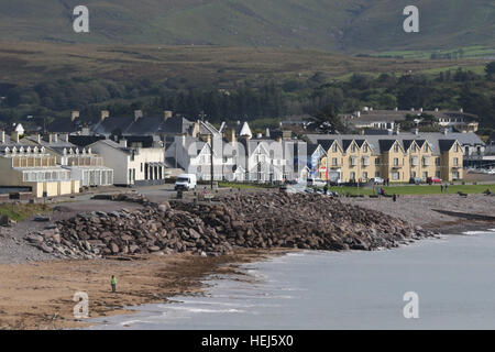 Houses and hotels on the coast of County Kerry at the coastal village of Waterville in County Kerry. Ireland. Stock Photo