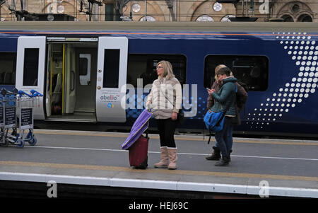 Scotrail Abellio train carriages & passengers,petition to bring back into state ownership,after poor service Stock Photo