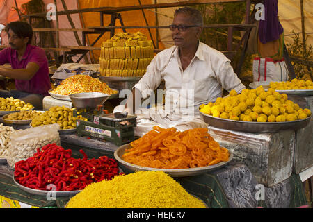 Vendor selling Indian sweets, Pune, Maharashtra India Stock Photo