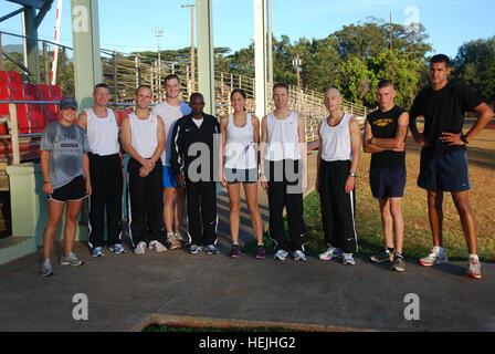 Army Hawaii Soldiers trained for and competed in 25th Annnual Army Ten Miler, 4 October, in Washington DC. From L-R. 2nd Lt. Ashley Gilbert, Lt. Col. Marty Muchow, Capt. Shawn Dodge, Capt. Chris Calway, Sgt. Sam Ngatia, Capt. Deborah Stonerook, Sgt. First Class Paul Lancaster, Capt. John Mozer, Spc. Joseph Kendall and Sgt. Ryan Moorcroft. US Army 53421 Hawaii wins first Commander's Cup at Army Ten-Miler Stock Photo