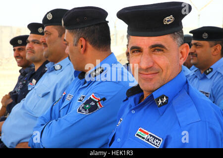 Iraqi police officers from the Basra Criminal Evidence Division ...