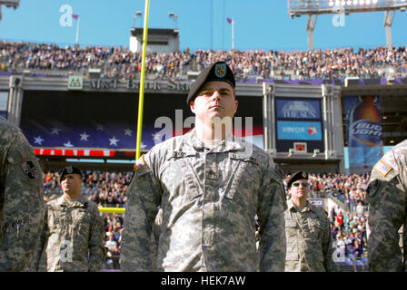 Select Maryland National Guard members were invited to M&T Bank Stadium to watch the Baltimore Ravens game Nov. 7, 2010. The Veteran's Day themed event featured a live feed to Iraq with Maryland Army National Guard Lt. Col. Nathan Crum, who is currently serving overseas. Maryland National Guard service members visit M& T; Bank Stadium Sunday November 7, for a Veterans Day celebration. 338531 Stock Photo