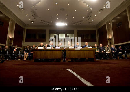From left, Army Chief of Staff Gen. George W. Casey Jr., Chief of Naval Operations Adm. Gary Roughead, Joint Chiefs Vice Chairman Marine Corps Gen. James Cartwright, Marine Corps Commandant Gen. James Amos, Air Force Chief of Staff Gen. Norton Schwartz, and Coast Guard Commandant Adm. Robert Papp Jr., testify on Capitol Hill in Washington Friday, Dec. 3, 2010, before the Senate Armed Service Committee's hearing on the military 'don't ask, don't tell' policy.  Army photo by D. Myles Cullen (released) Defense.gov photo essay 101203-A-0193C-005 Stock Photo