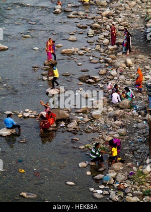 Indian people on the banks of the Kosi River at Garjia, Uttarakhand, India Stock Photo