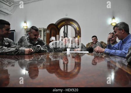 U.S. Rep. Todd Platts, R-Pa., (right), a member of the House Armed Services Committee, meets with soldiers with the 228th Engineer Company, 1st Battalion, 63rd Armored Regiment, 2nd Advise and Assist Brigade, 1st Infantry Division, United States Division - Center, Feb. 2 at Camp Liberty, Iraq. (Photo by: Staff Sgt. Justin Phemister) %%%%%%%%E2%%%%%%%%80%%%%%%%%98Dragon%%%%%%%%E2%%%%%%%%80%%%%%%%%99 Battalion engineer company hosts US congressman 365496 Stock Photo