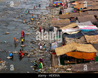 Indian people on the banks of the Kosi River at Garjia, Uttarakhand, India Stock Photo