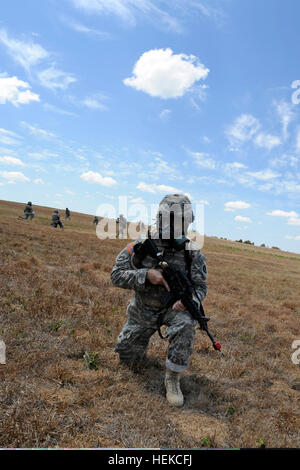 Mobilisation Mask A Soldier from Task Force Raptor (3-124) practices grenade launching as ...