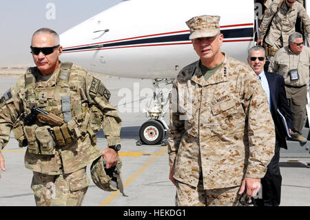 In this photo provided by ISAF Regional Command South, Marine Corps Gen. John R. Allen, ISAF commander, is escorted by Army Maj. Gen. James L. Terry, RC-South and 10th Mountain Division (Light) commander, after arriving at Kandahar Airfield, Sept. 12, 2011. Allen was changing planes to attend a conference with Terry, as well as other U.S. and Afghan leaders, to discuss reintegration. Maj. Gen. Terry escorts ISAF commander Gen. Allen at Kandahar Airfield 455822 Stock Photo