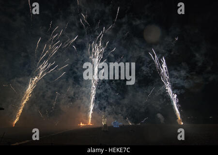 Brighton, UK. 21st December, 2016.  Thousand of spectators gathered to watch The Burning the Clocks on Brighton Beach, Thousands of clocks are loaded onto the boat on the beach then set on fire and a with firework finale to mark the winter solstice, England.© Jason Richardson / Alamy Live News Stock Photo