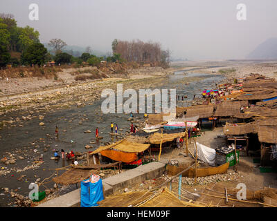 Indian people on the banks of the Kosi River at Garjia, Uttarakhand, India Stock Photo