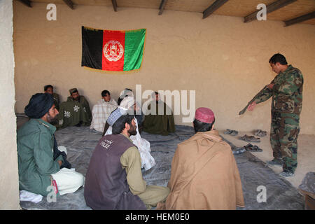 Afghan Local Police candidates receive first aid training from Afghan National Army Special Forces in Kajran, Daukundi province, Afghanistan, Nov. 23, 2011. The ALP are being trained to become well rounded patrolmen to help maintain security in the surrounding area. ALP academy 111123-A-NC985-015 Stock Photo