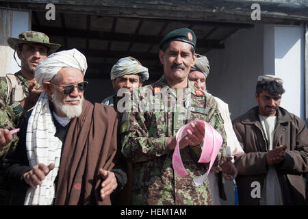 A Village Elder in Kandahar, Afghanistan passes time, waiting for the ...