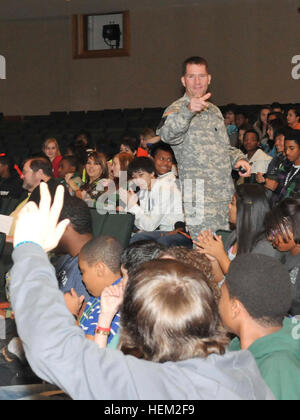 Students were eager to ask questions about the lessons which correlated Buffalo Soldiers and the 9th Cavalry Regiment as well as personal questions to Lt. Col. Cameron Cantlon, the commander for the 6th Squadron, 9th Cavalry Regiment, 3rd Brigade Combat Team, 1st Cavalry Division. This is part of Adopt-a-School program held at Ellison High School, Feb. 8, 2012. Saber Squadron commemorates black history at Ellison High School 120208-A--027 Stock Photo
