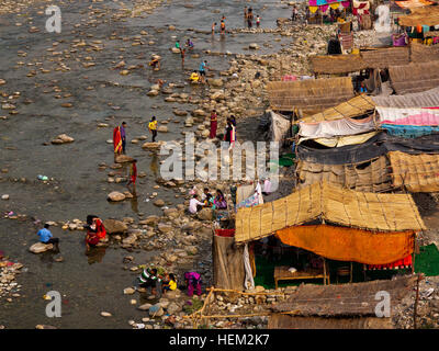 Indian people on the banks of the Kosi River at Garjia, Uttarakhand, India Stock Photo