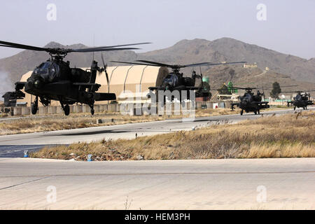 Four AH-64D Apache Longbows with Task Force Wolfpack depart from Forward Operating Base Salerno in support of combat operations in Ghazni province March 21. (U.S. Army photo by Spc. Erin Dierschow, Task Force Poseidon Public Affairs) Apache Longbow 549015 Stock Photo