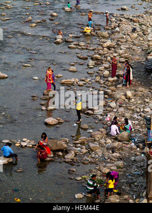 Indian people on the banks of the Kosi River at Garjia, Uttarakhand, India Stock Photo