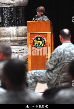 Brig. Gen. Mary Legere, director for intelligence, Multi-National Force - Iraq, uses slides to teach service members and civilians about significant female environmentalists throughout history at Al Faw Palace, March 30, during a Women's History Month ceremony centering on 'women taking the lead to save our planet.' Legere was the keynote speaker for the ceremony. Multi-National Corps - Iraq Women's History Month ceremony 161623 Stock Photo