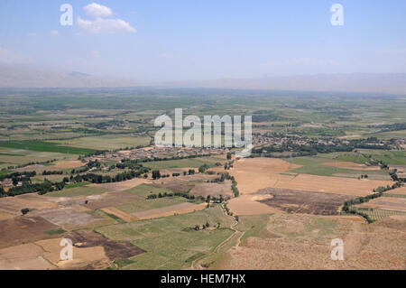 An aerial view from the window of a Blackhawk helicopter between Mazar-e-Sharif, Balkh Province, and Kunduz, Kunduz Province, Afghanistan, June 27, 2012. (37th IBCT photo by Sgt. Kimberly Lamb) (Released) 120627-A-LE308-009 Stock Photo