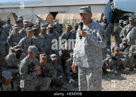 Maj. Gen. Simeon Trombitas, commanding general, Joint Task Force-Haiti, addresses Soldiers from 377th Theater Sustainment Command, Foxtrot Company, 2-325th Airborne Infantry Regiment and 602nd Area Support Medical Company as they prepare to redeploy home May 3. Trombitas told they Soldiers that Haitians would remember all the relief work they assisted in during Operation Unified Response. The troops deployed to Haiti almost three months ago to offer aid after the Jan. 12 earthquake. Action from Haiti 275424 Stock Photo
