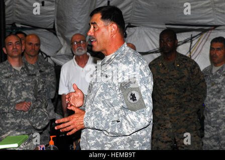 Maj. Gen. Simeon Trombitas, commanding general, JTF-Haiti, explains the mission of JTF-Haiti and Operation Unified Response to a Capstone class during their tour of LSA Dragon. Capstone is a joint service military education six-week course for newly promoted brigadier generals and rear admirals, as well as civilian workers with the Department of Defense. The group arrived in Haiti as part of a two-week tour in Latin America. The party visited the U.S. Embassy, took a Blackhawk tour of Port-au-Prince and then was escorted by MINUSTAH forces during a vehicle tour of down town Port-au-Prince. The Stock Photo