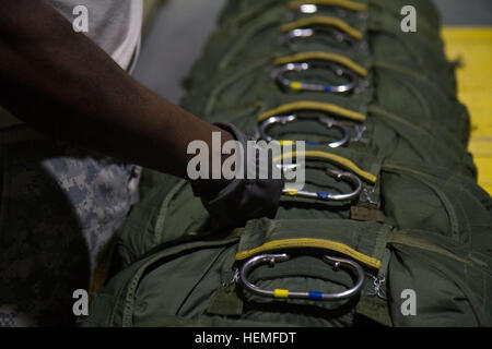 An Army Reserve parachute rigger from the 824th Quartermaster Company ...