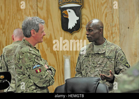 British Army Gen. Sir Richard Shirreff, left, NATO's Deputy Supreme Allied Commander Europe, speaks with U.S. Army Brig. Gen. Ronald Lewis, the deputy commanding general for Support, 101st Airborne Division, at Forward Operating Base Gamberi in Laghman province, Afghanistan, April 16, 2013. During his visit to the base, Shirreff met with U.S. and Afghan National Army (ANA) senior leaders and visited ANA soldiers as they conducted counter-improvised explosive device training. (U.S. Army photo by Staff Sgt. Richard Andrade/Released) Deputy supreme allied commander Europe visits FOB Gamberi 13042 Stock Photo