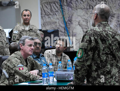 British Army Gen. Sir Richard Shirreff, left, NATO's Deputy Supreme Allied Commander Europe, listens to Afghan National Army (ANA) Maj. Gen. Abdul Nasser Ziayi, right, the deputy commander of the ANA's 201st Corps, during a meeting at Forward Operating Base Gamberi in Laghman province, Afghanistan, April 16, 2013.  (U.S. Army photo by Staff Sgt. Richard Andrade/Released) Deputy Supreme Allied Commander Europe visits FOB Gamberi 130421-A-UO630-007 Stock Photo