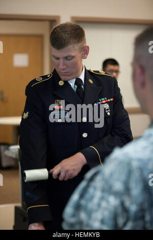 Reserve, United States. 27th June, 2024. A young man watch the debate ...